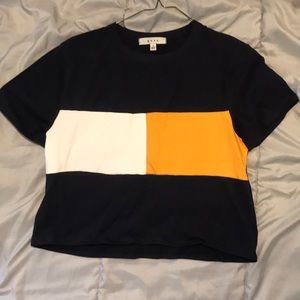 Navy blue crop top with yellow and white stripe